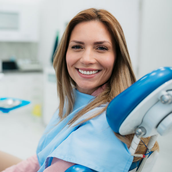 woman smiling in dental chair